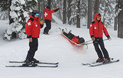 ski patrollers in uniform